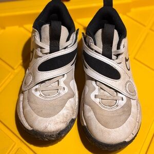 Kids Beige and Black Nike Shoes